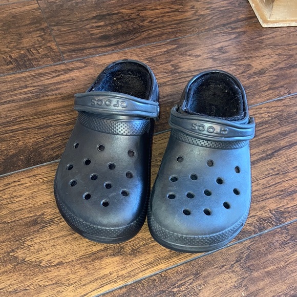 black furry crocs